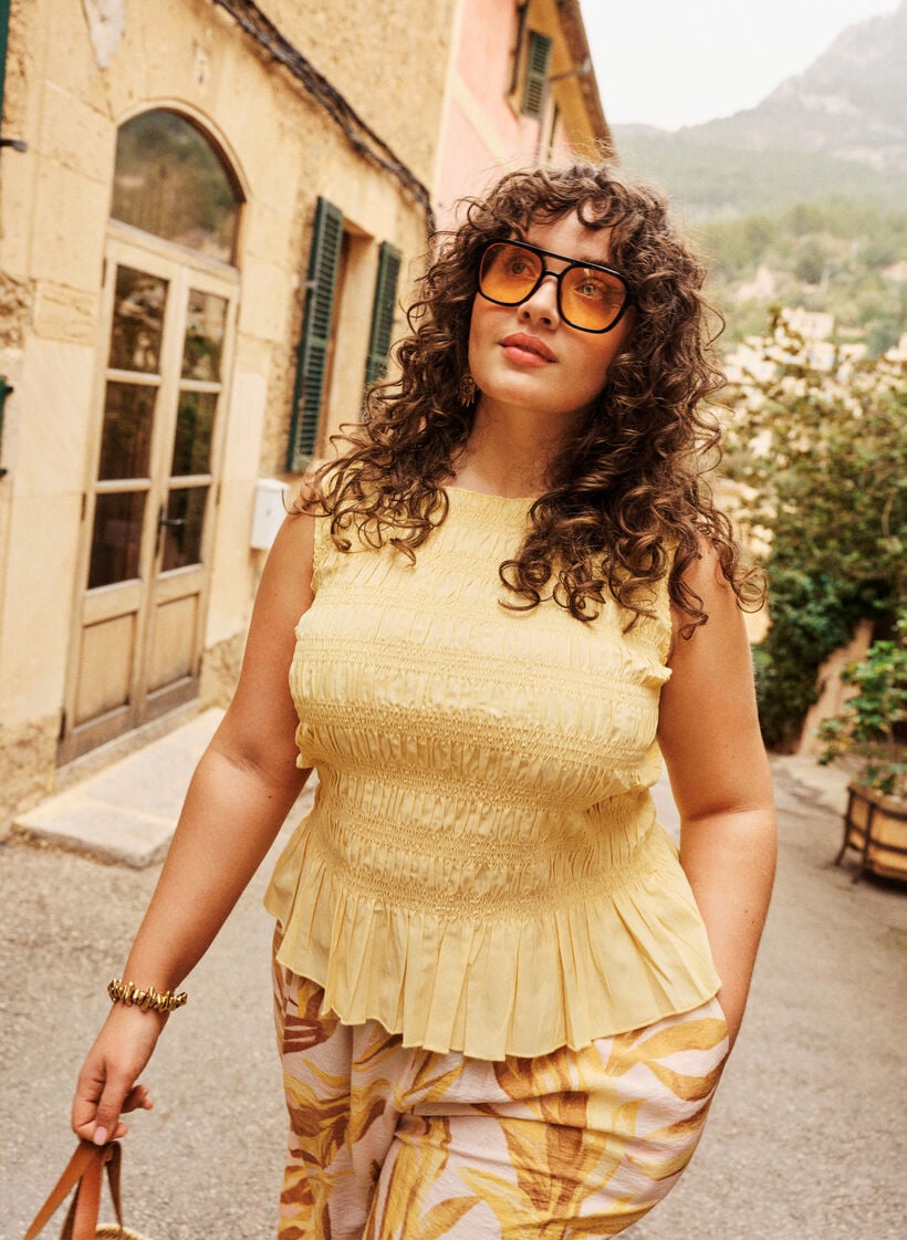 Smokkitoppi venep&auml;&auml;ntiell&auml; ja peplum-helmalla, Keltainen, Image image number 0