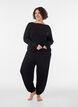 Rennot pyjamahousut viskoosista, joustavalla vy&ouml;t&auml;r&ouml;ll&auml;, Musta, Model image number 0