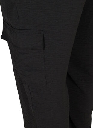 Väljät housut suurilla taskuilla, Black, Packshot image number 3