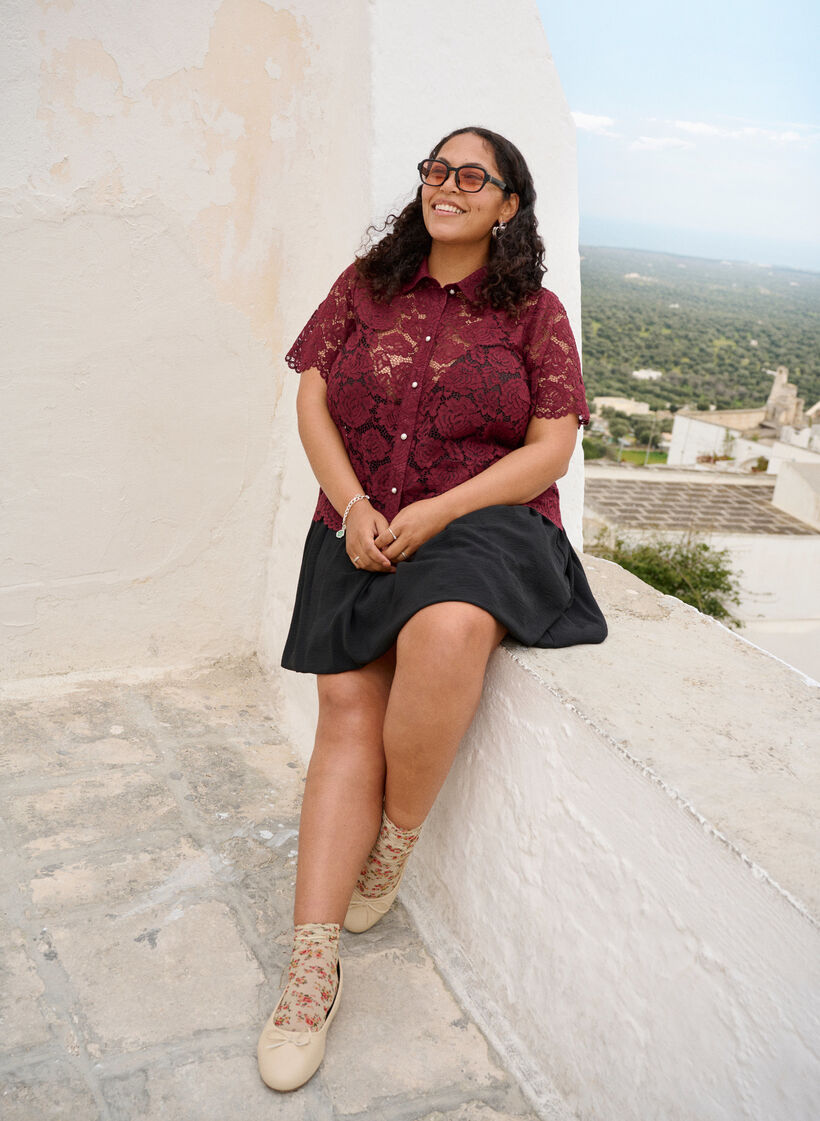 Lyhyt pallomainen hame, jossa on joustava vy&ouml;t&auml;r&ouml;nauha, Musta, Image image number 0