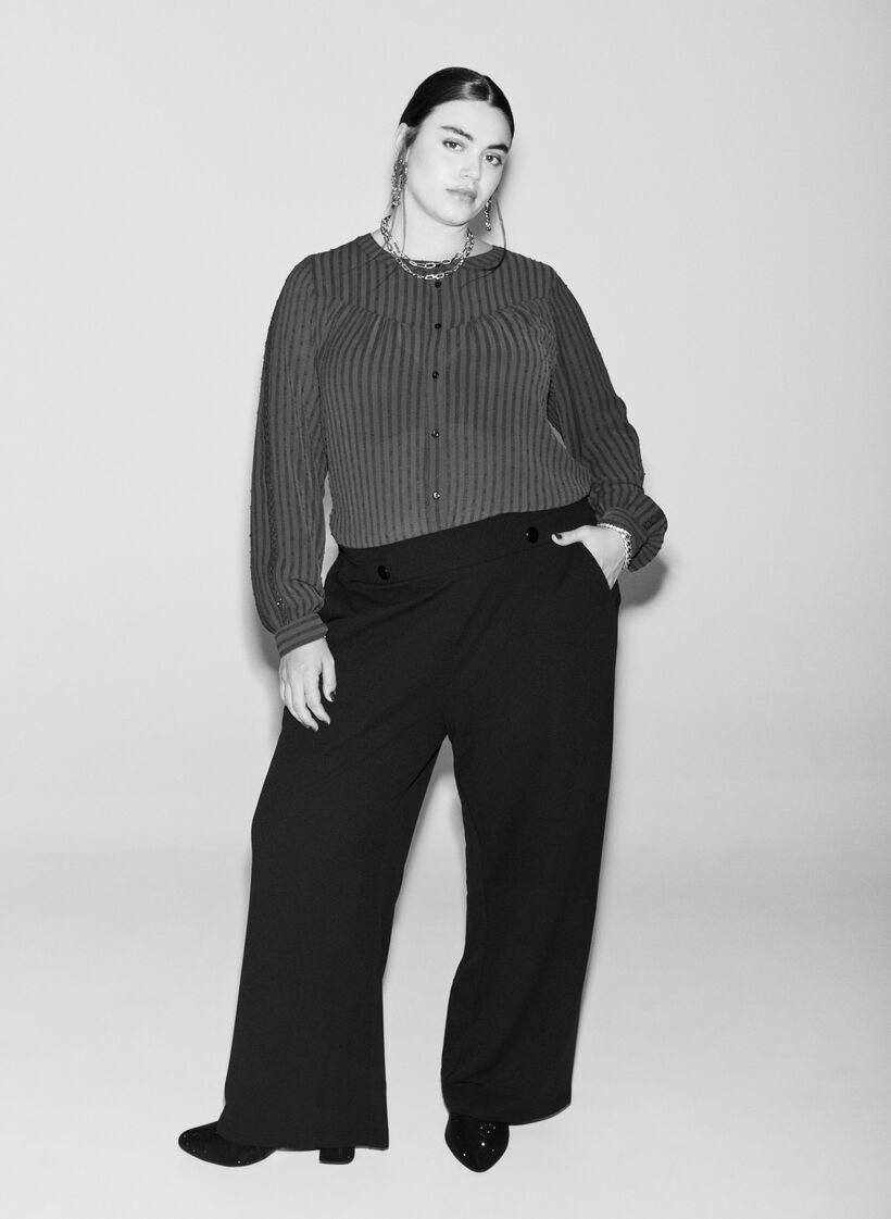 Rennot housut taskuilla, Musta, Image image number 0