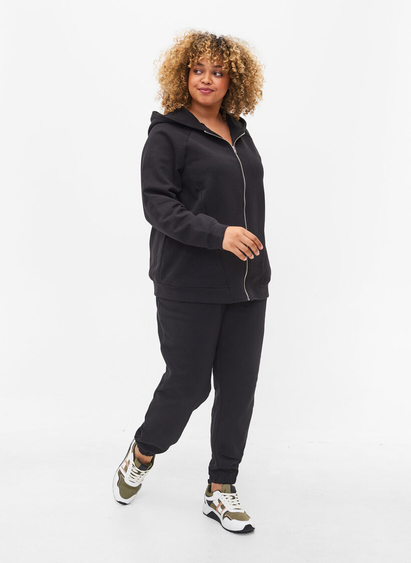 V&auml;lj&auml;t puuvillahousut taskuilla, Musta, Model image number 0
