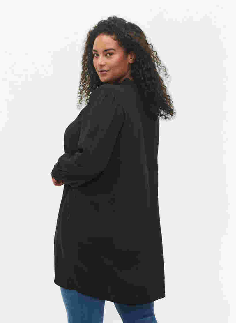Tunika röyhelökauluksella ja pitkillä hihoilla, Black, Model image number 1