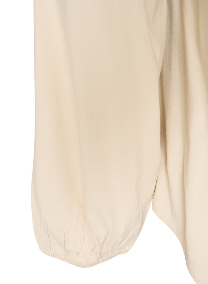 Viskoosipusero V-p&auml;&auml;ntiell&auml; ja py&ouml;ristetyll&auml; helmalla, Beige, Packshot image number 3