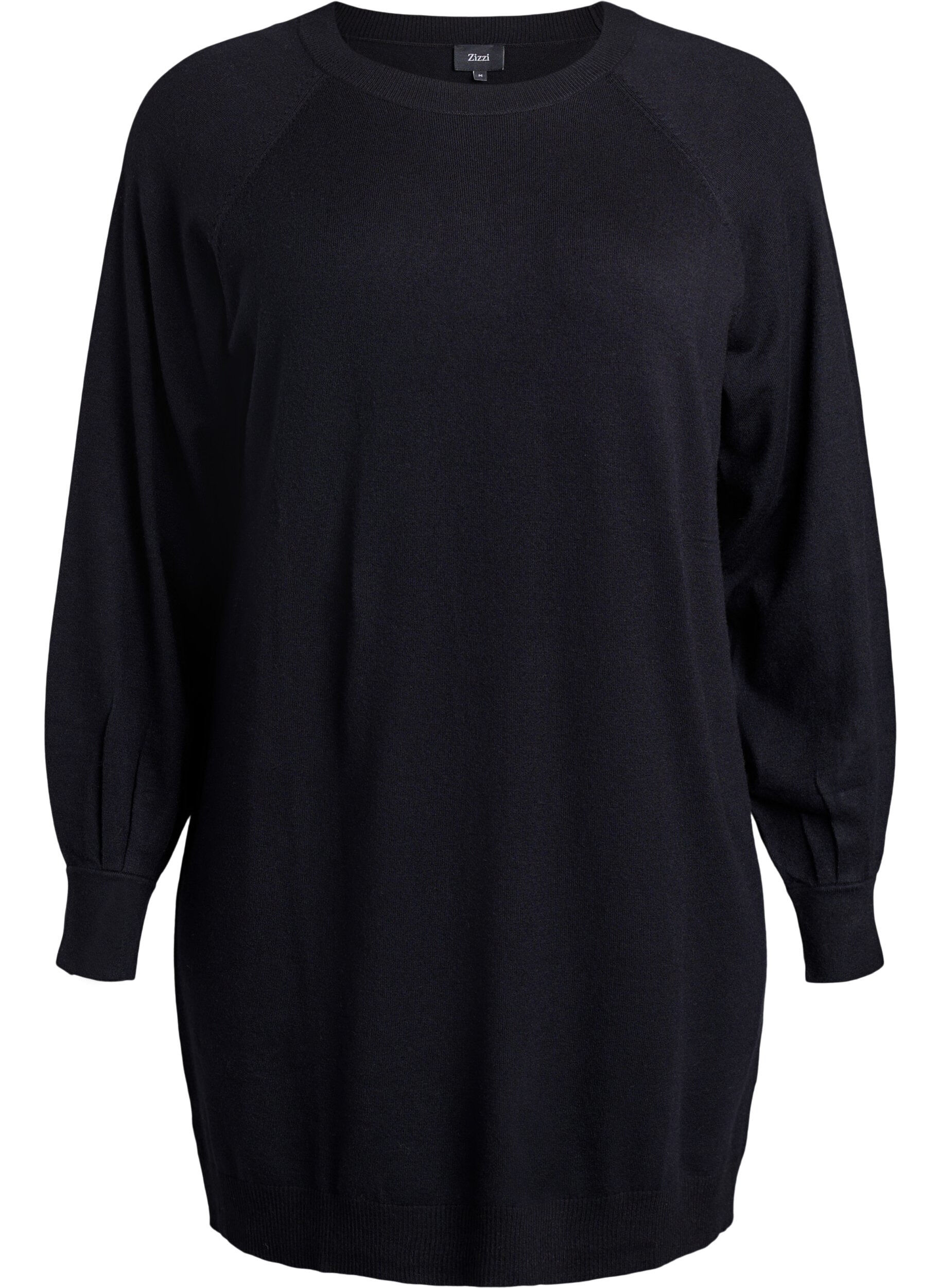 Lyhyt neulemekko raglanhihoilla