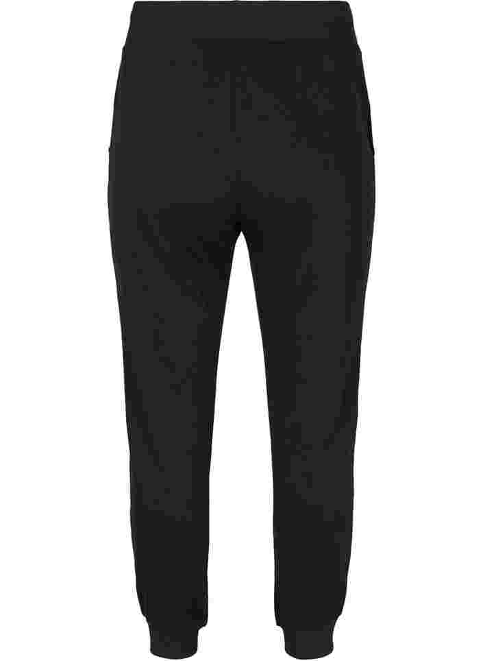 Yksiväriset treenihousut taskuilla, Black, Packshot image number 1