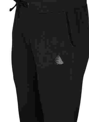 Yksiväriset treenihousut taskuilla, Black, Packshot image number 2