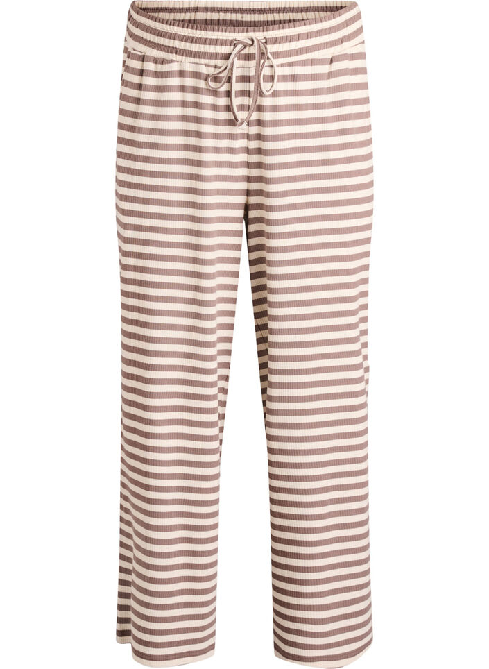Raidalliset pyjamahousut korkealla vy&ouml;t&auml;r&ouml;ll&auml; ja leveill&auml; lahkeilla, Beige, Packshot image number 0