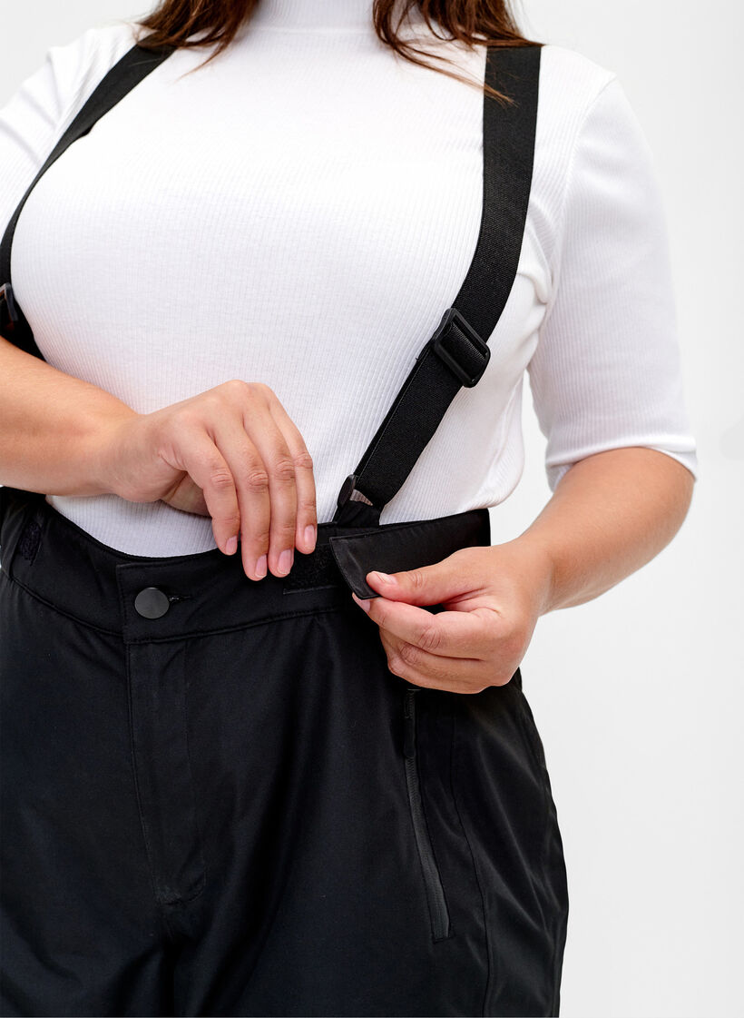 Hiihtohousut, joissa on henkselit, Black, Model image number 3