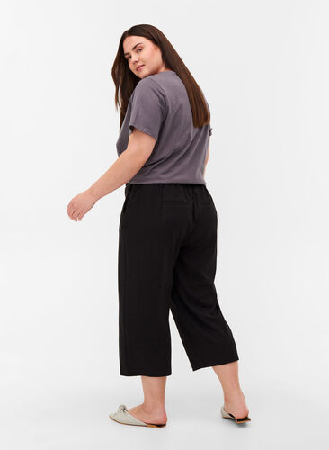 Yksiväriset culottes-housut taskuilla , Black, Model image number 1