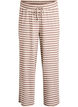 Raidalliset pyjamahousut korkealla vy&ouml;t&auml;r&ouml;ll&auml; ja leveill&auml; lahkeilla, Beige, Packshot image number 0