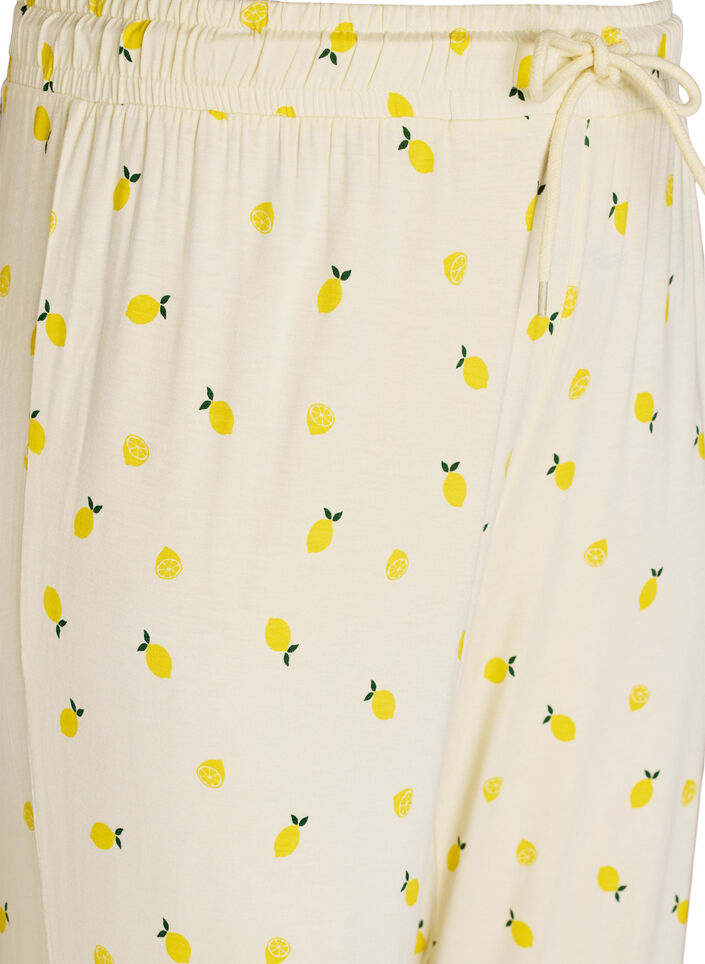 Pyjamahousut pehme&auml;st&auml; jersey-materiaalista, korkea vy&ouml;t&auml;r&ouml; ja hedelm&auml;kuosi, Keltainen, Packshot image number 2