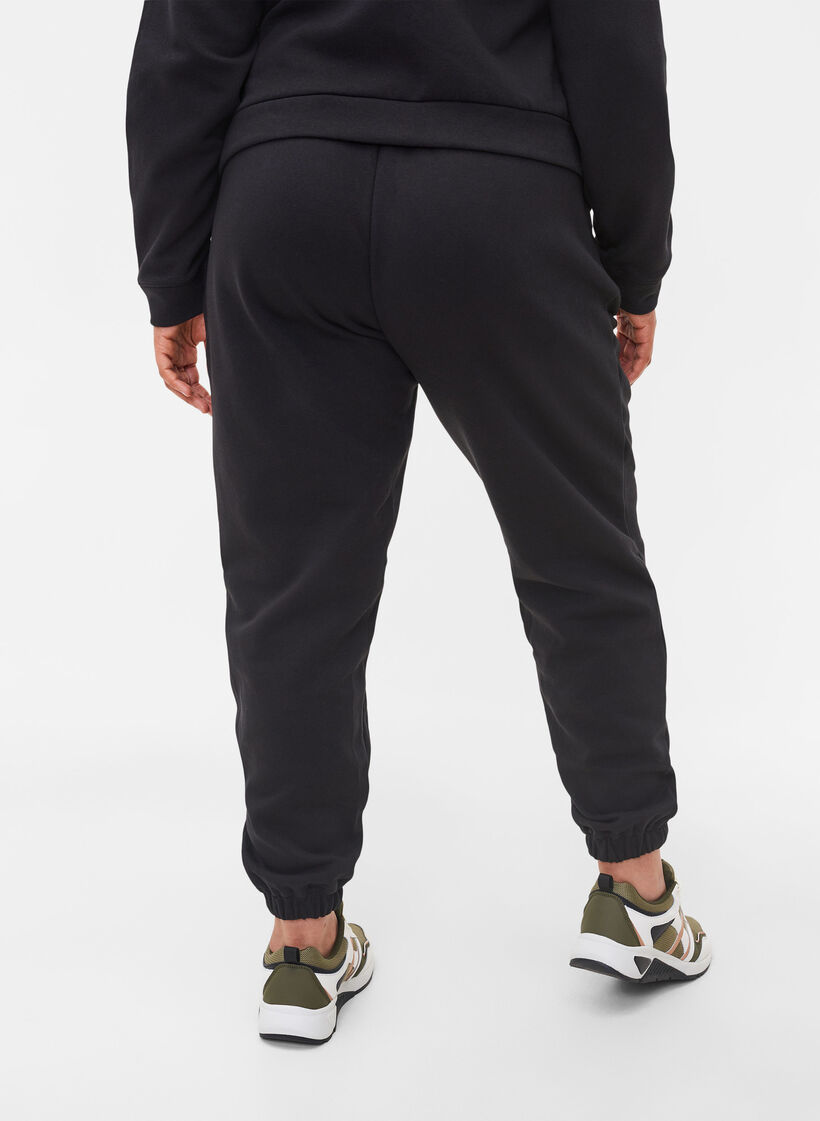 V&auml;lj&auml;t puuvillahousut taskuilla, Musta, Model image number 1
