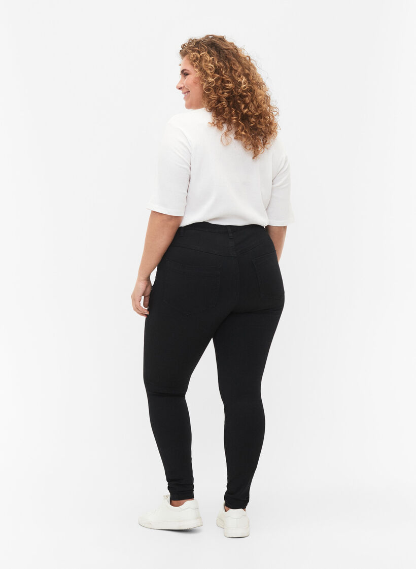 Super slim Amy-farkut korkealla vy&ouml;t&auml;r&ouml;ll&auml;, Black, Model image number 1
