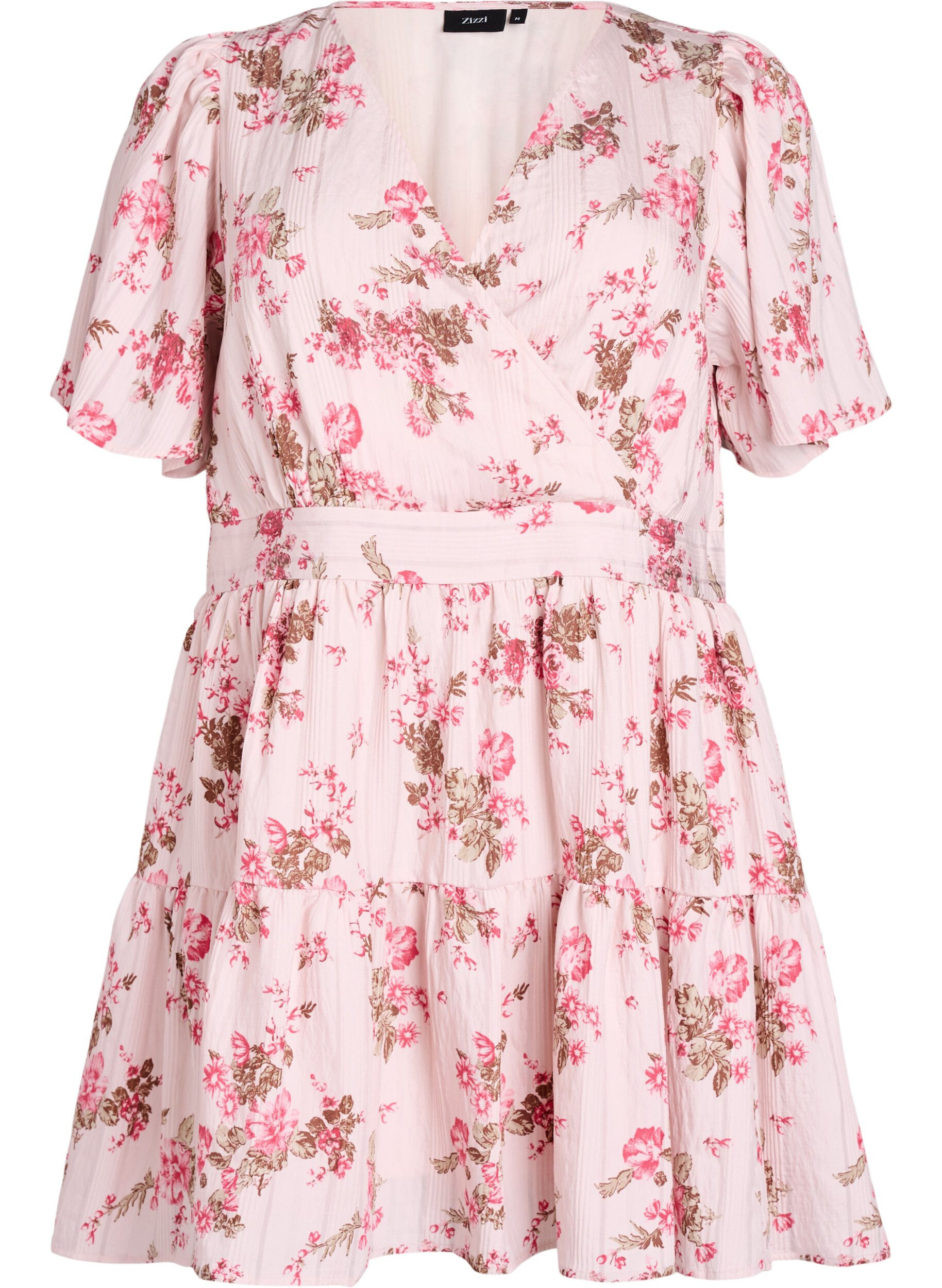 Lyhyt kukkamekko, jossa on V-p&auml;&auml;ntie