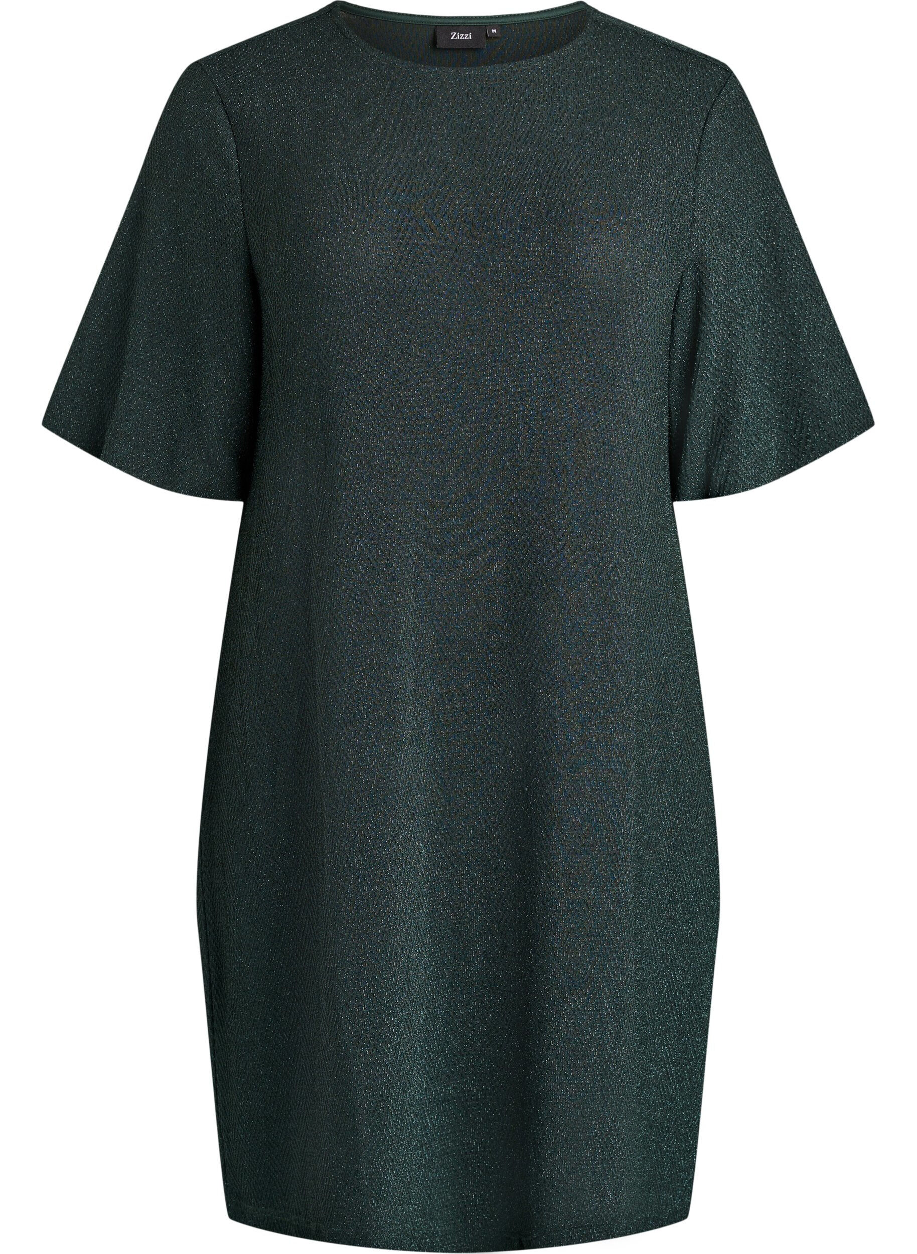 Lyhyt mekko kimallekuviolla