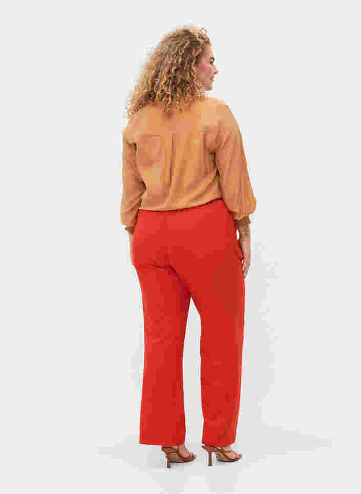 Leveälahkeiset housut taskuilla, Fiery Red, Model image number 1