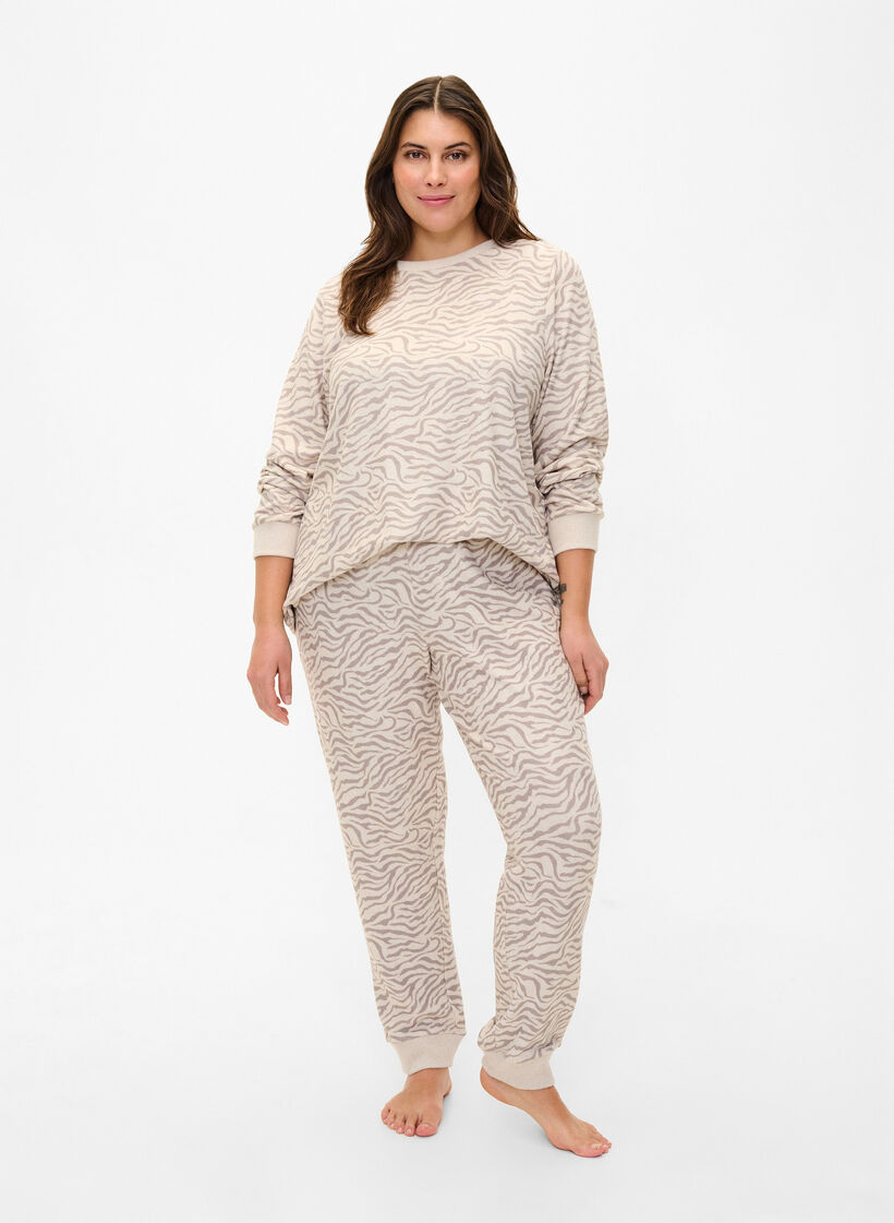 Printatut veluurihousut, Pink Tint AOP, Model image number 0