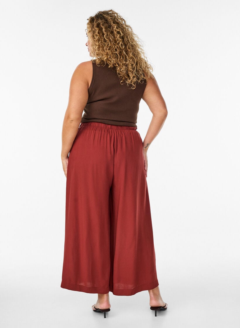 Culotte-housut, joissa on korkeavy&ouml;t&auml;r&ouml; ja leve&auml;t lahkeet viskoosista., Punainen, Model image number 1