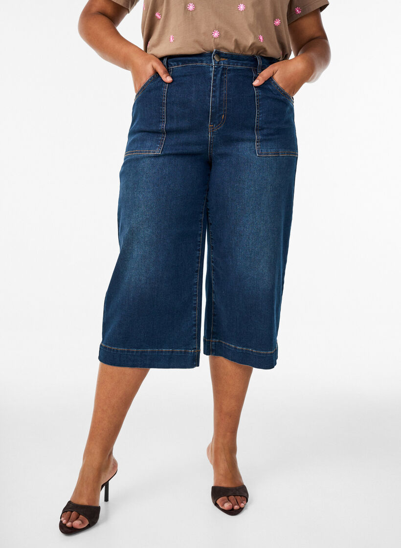 Denim-housut leveill&auml; lahkeilla, Sininen, Model image number 0