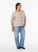 Neuletakki rusetinapeilla ja avoneulekuviolla, Beige, Model image number 1