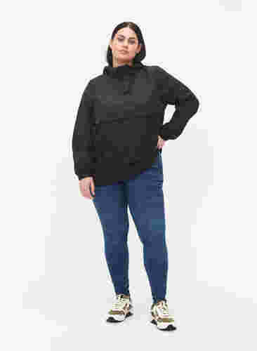 Anorakki hupulla ja taskulla, Black, Model image number 1