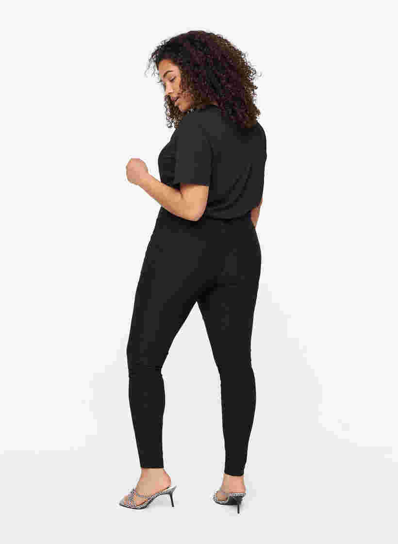 Tyköistuvat housut vetoketjuyksityiskohdilla , Black, Model image number 1