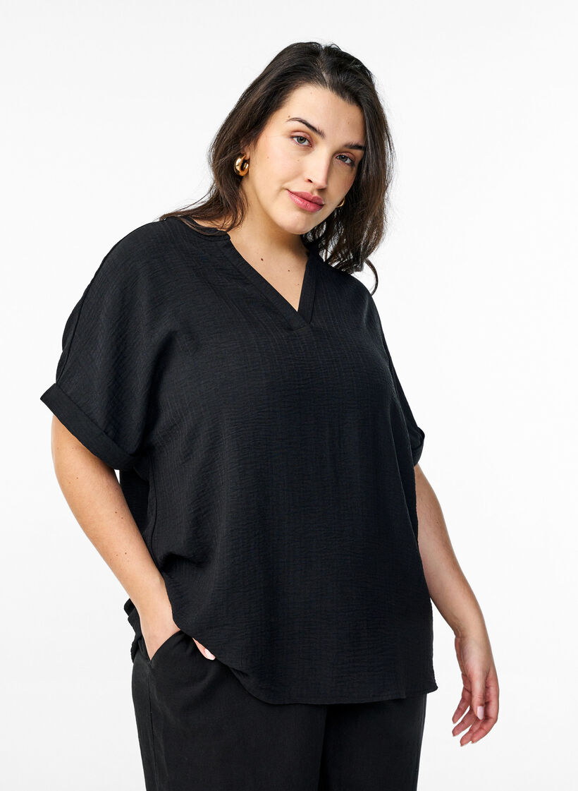 Rento pusero lyhyill&auml; hihoilla, Musta, Model image number 0
