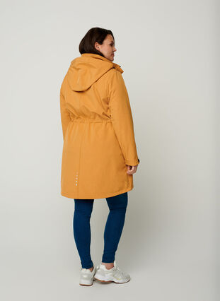 Pitkä hupullinen softshell-takki, Spruce Yellow, Model image number 1