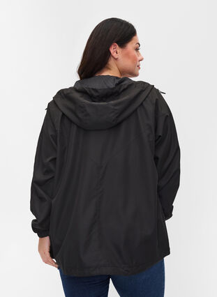 Lyhyt takki hupulla ja säädettävällä helmalla , Black, Model image number 1