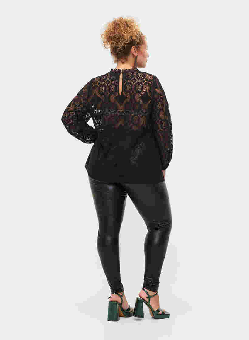 Pinnoitetut leggingsit vuorella, Black, Model image number 1