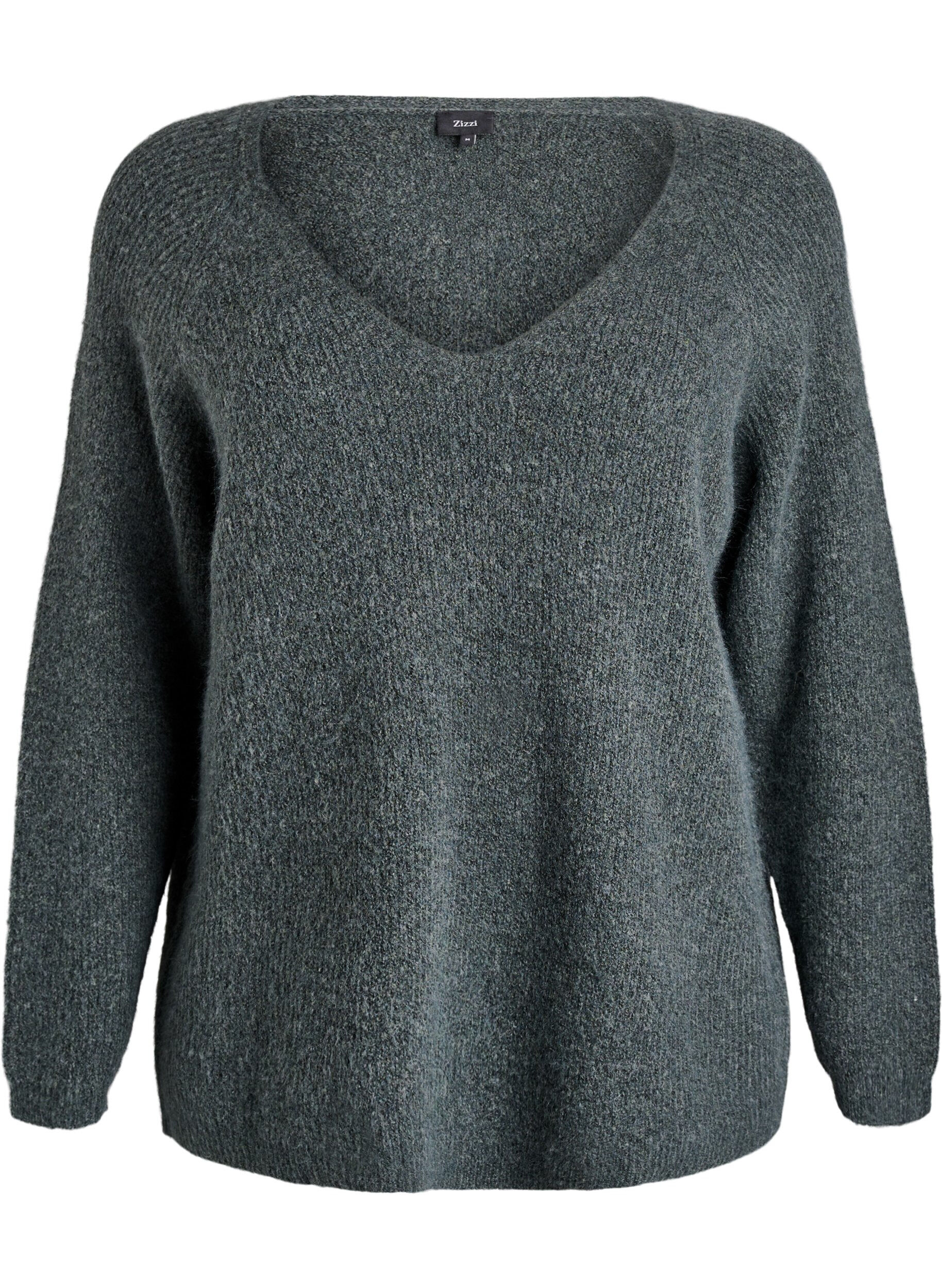 Neulepusero v-p&auml;&auml;ntiell&auml; ja raglanhihoilla