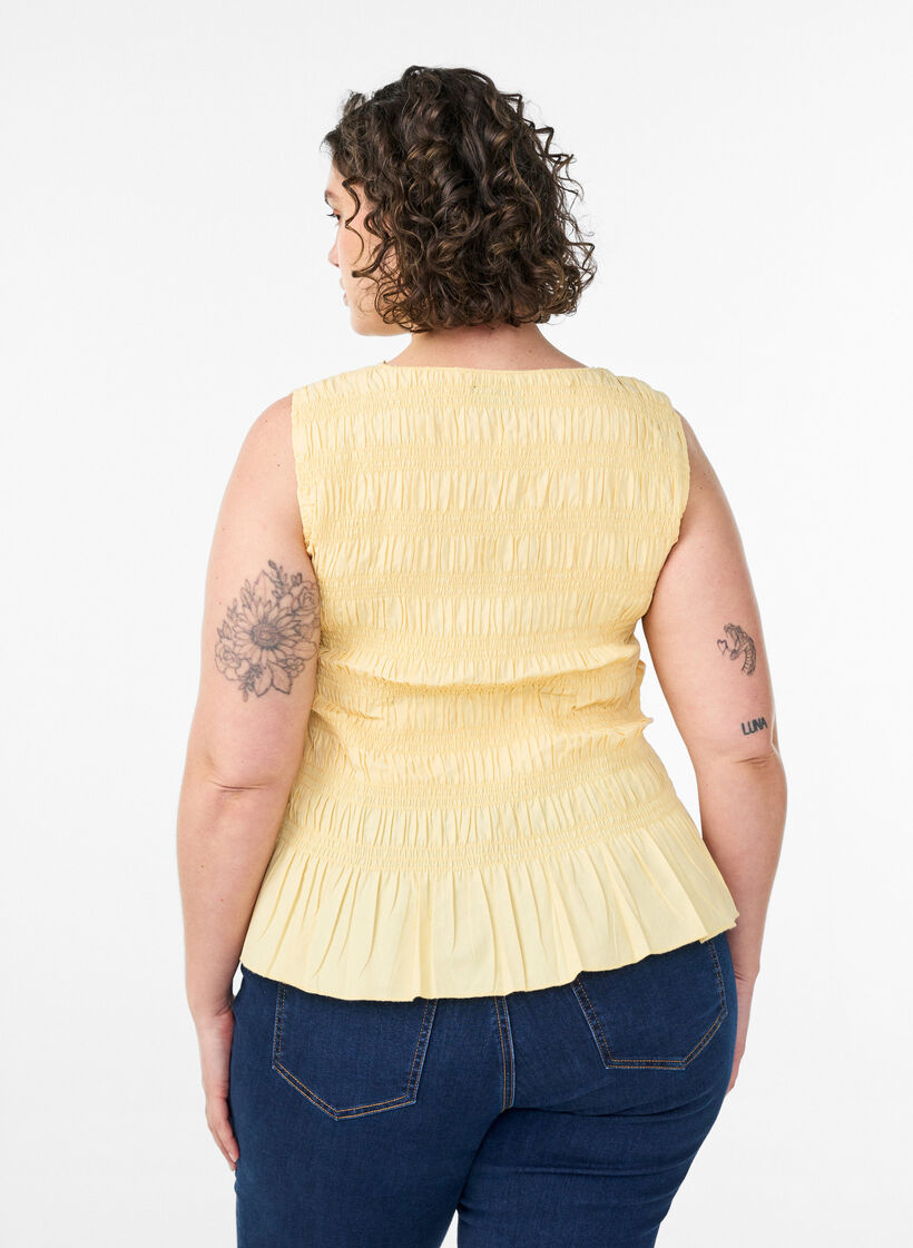 Smokkitoppi venep&auml;&auml;ntiell&auml; ja peplum-helmalla, Keltainen, Model image number 2