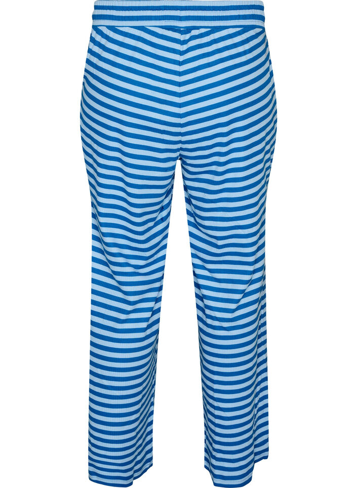 Raidalliset pyjamahousut korkealla vy&ouml;t&auml;r&ouml;ll&auml; ja leveill&auml; lahkeilla, Sininen, Packshot image number 1
