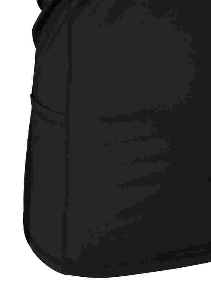 Tyköistuva treenitoppi taskuilla , Black, Packshot image number 3