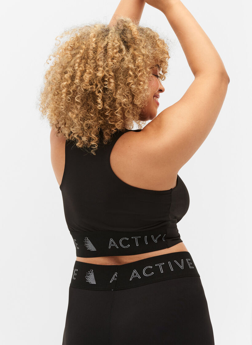 Urheilurintaliivit ristiyksityiskohdalla, Black, Model image number 1