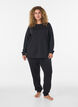 Pitk&auml;hihainen jerseypusero py&ouml;re&auml;ll&auml; p&auml;&auml;ntiell&auml;, Musta, Model image number 1