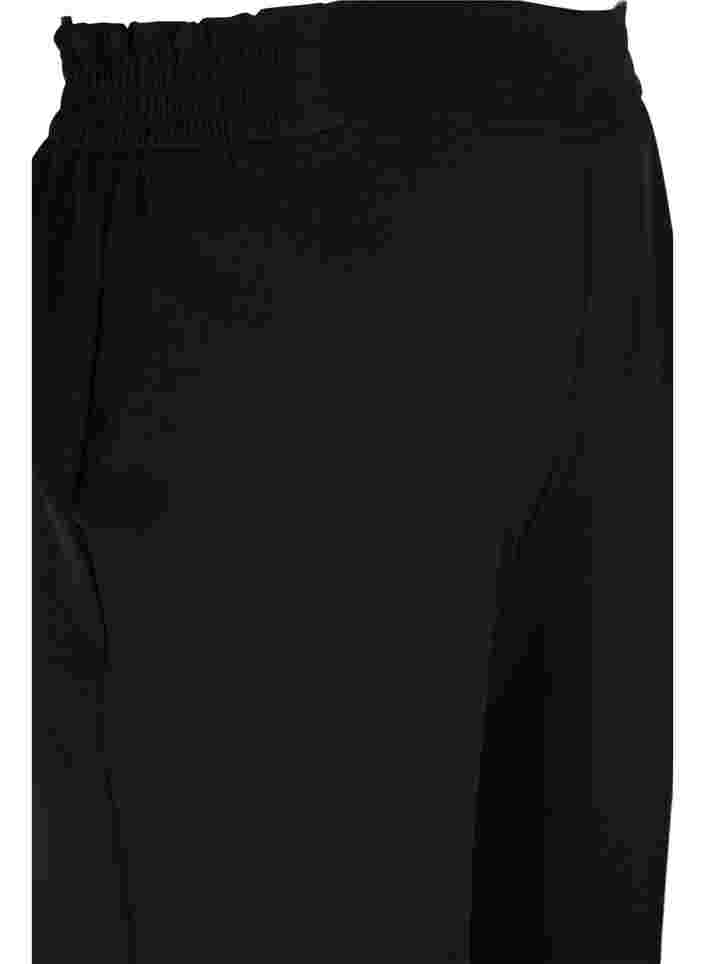 Yksiväriset housut leveillä lahkeilla, Black, Packshot image number 3