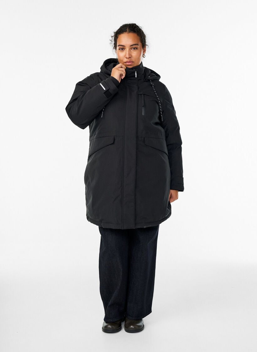 Vett&auml;hylkiv&auml; parka hupulla ja k&auml;yt&auml;nn&ouml;llisill&auml; yksityiskohdilla, Musta, Model image number 1