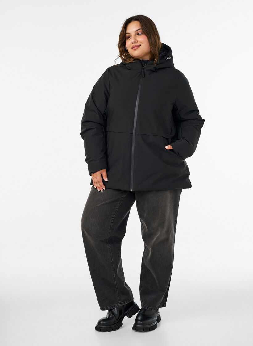 Talvitakki hupulla ja s&auml;&auml;dett&auml;v&auml;ll&auml; vy&ouml;t&auml;r&ouml;ll&auml;, Musta, Model image number 1