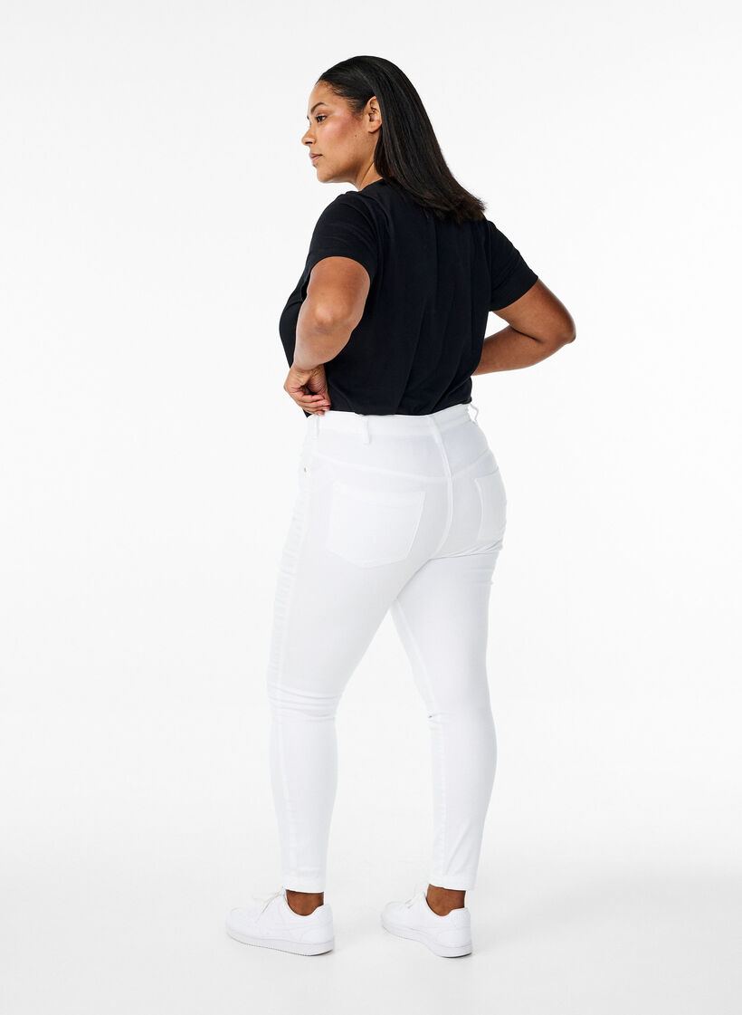 Super slim Amy-farkut korkealla vy&ouml;t&auml;r&ouml;ll&auml;, White, Model image number 1