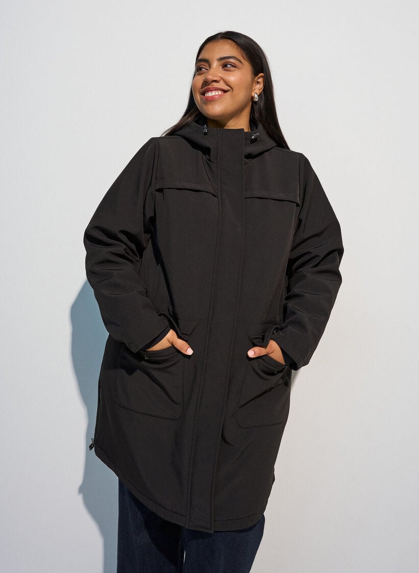 Vett&auml; hylkiv&auml; softshell-takki, jossa on tikattu vuori, Musta, Model image number 0