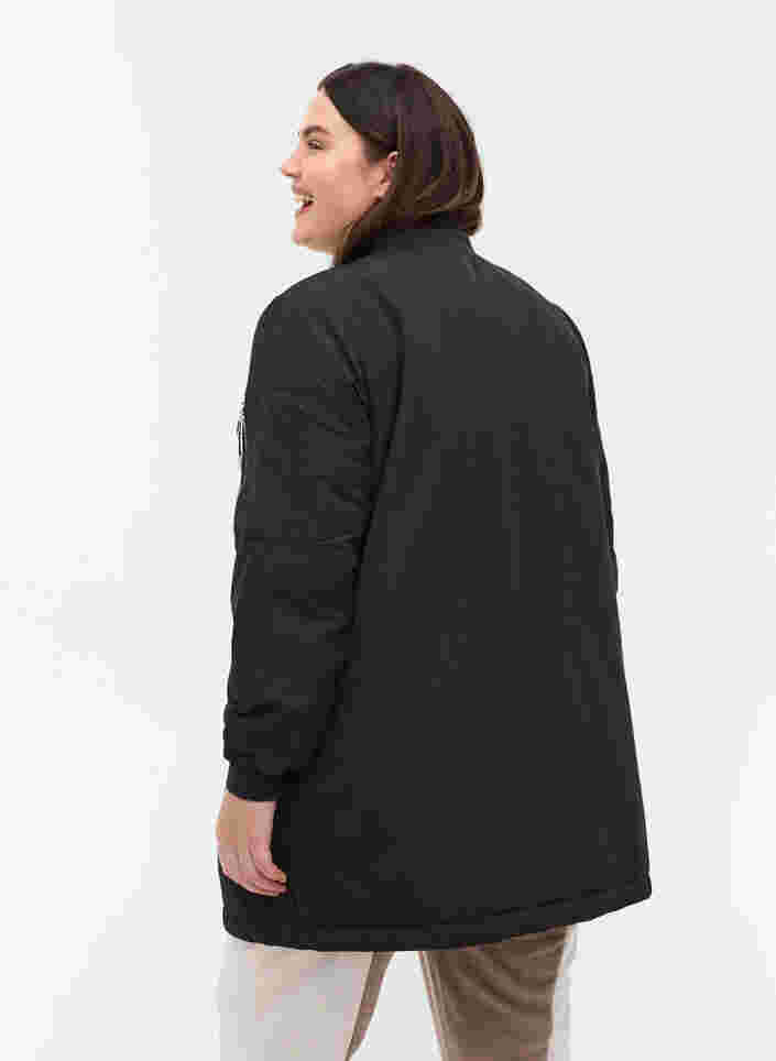 Pitkä bombertakki taskuilla, Black, Model image number 1