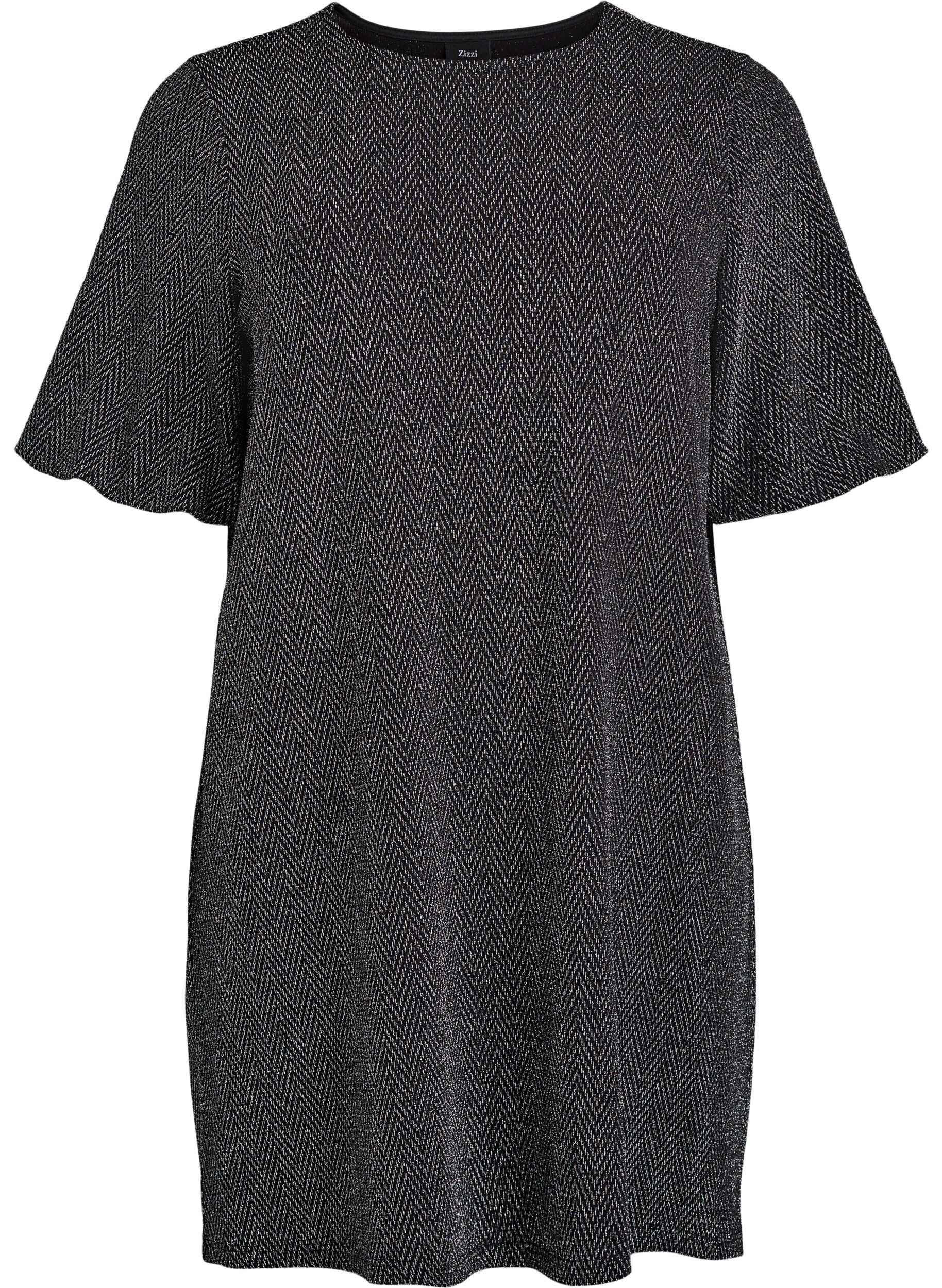 Lyhyt mekko kimallekuviolla