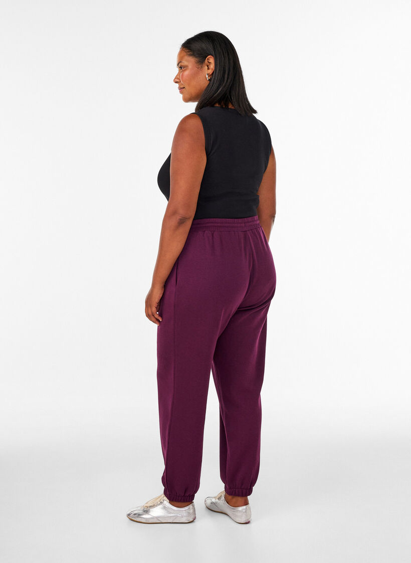 Korkeavy&ouml;t&auml;r&ouml;iset collegehousut kiristysny&ouml;rill&auml;, Violetti, Model image number 1