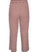 Raidalliset pyjamahousut korkealla vy&ouml;t&auml;r&ouml;ll&auml; ja leveill&auml; lahkeilla, Punainen, Packshot image number 1