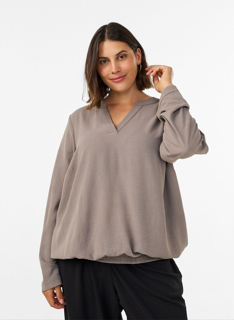 Pusero pallomaisella siluetilla ja V-p&auml;&auml;ntiell&auml;, Beige, Model image number 0