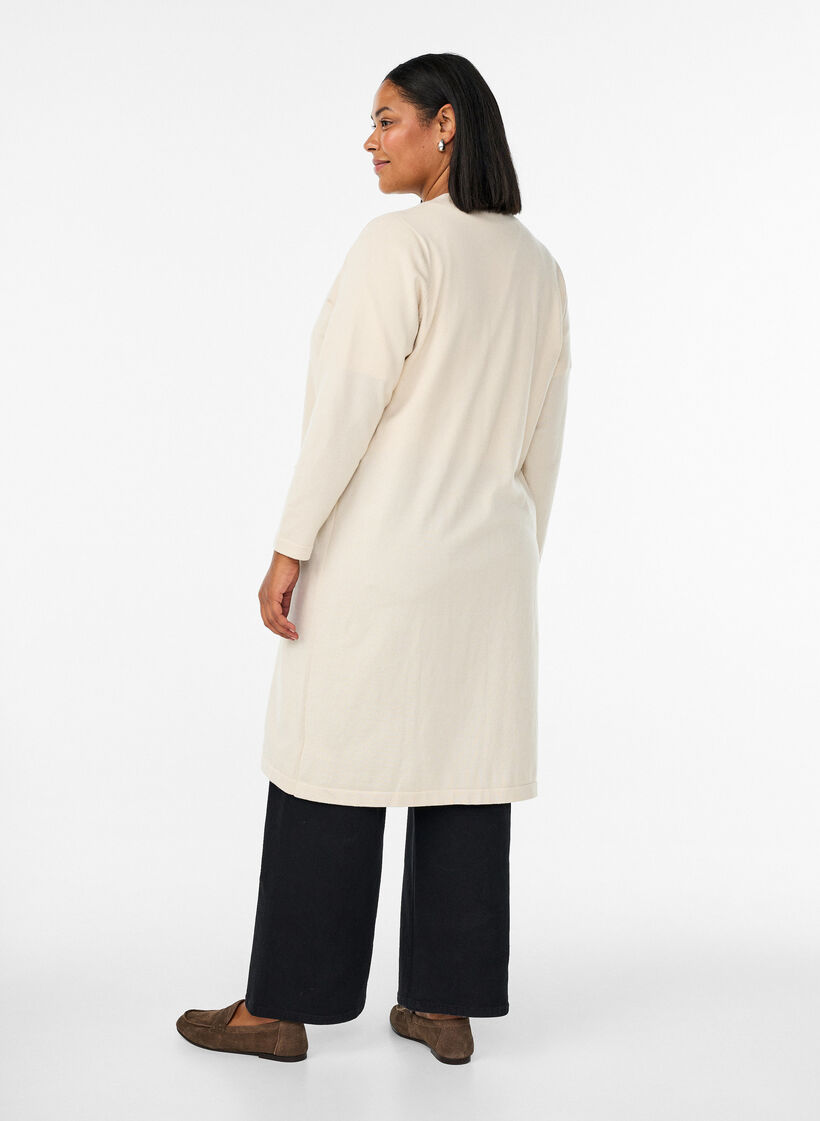 Pitk&auml;, avoin neuletakki taskuilla, Beige, Model image number 1