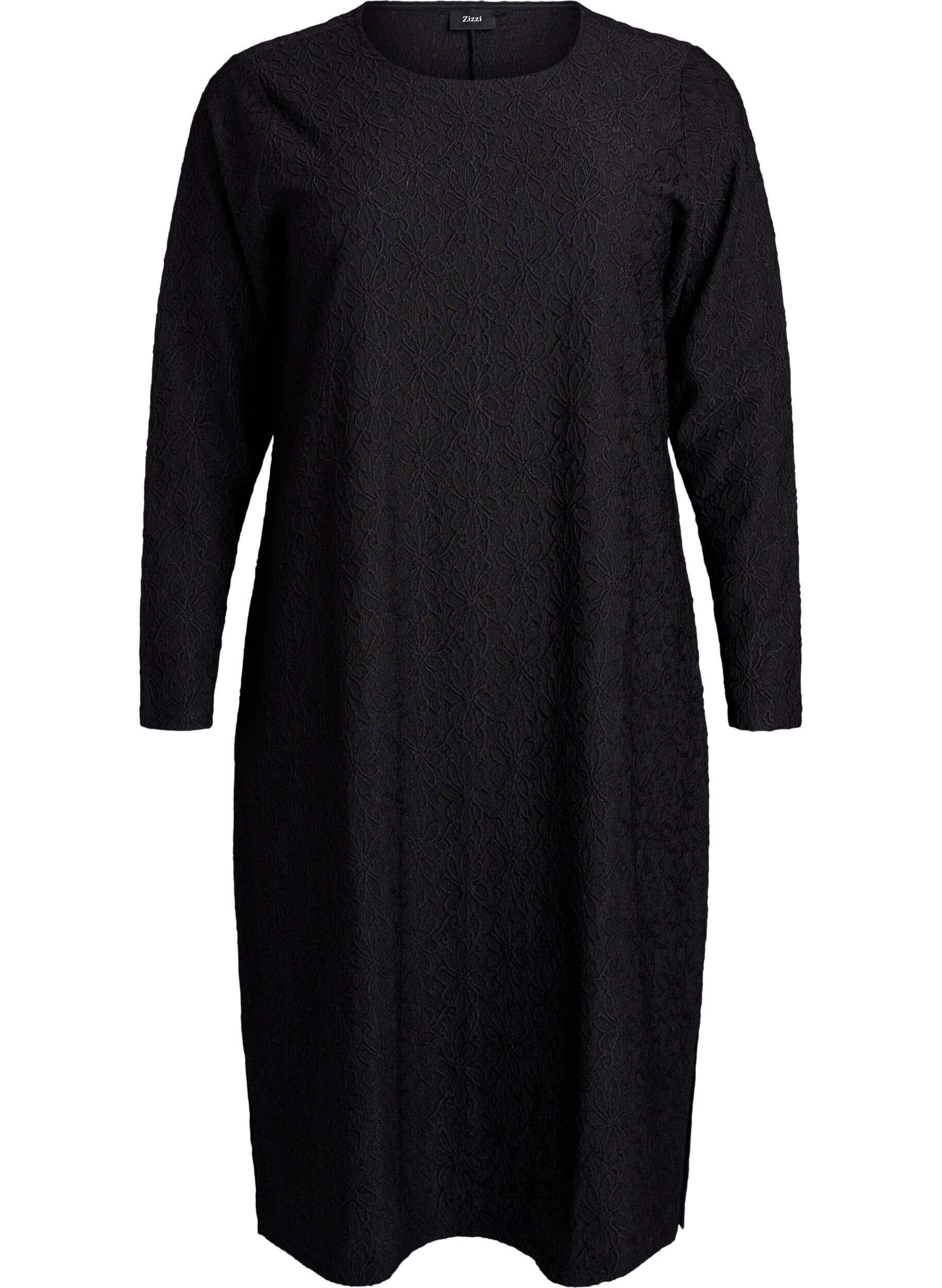 Kukallinen kohopintainen mekko pitkill&auml; hihoilla