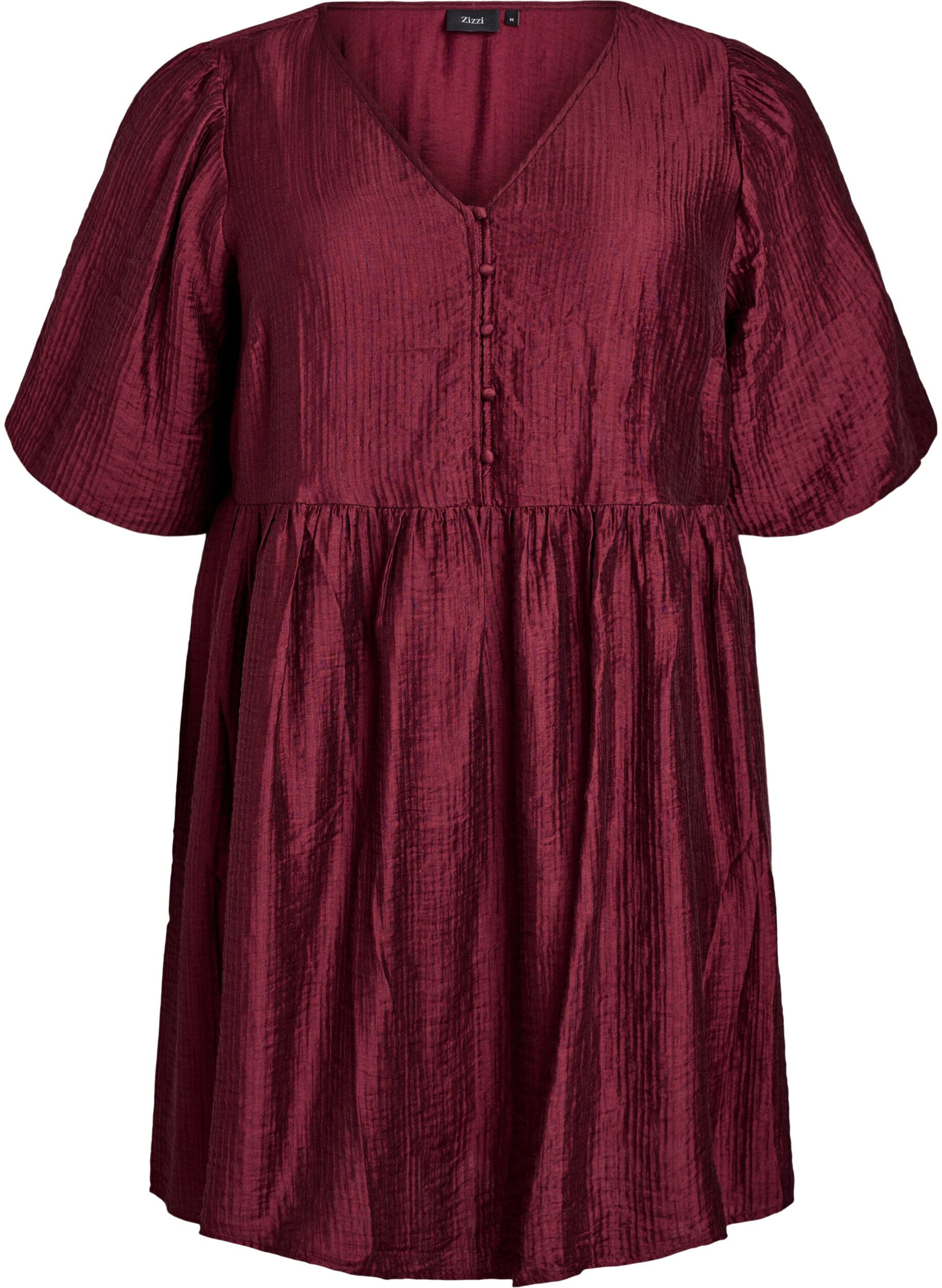 Lyhyt mekko tekstuurilla ja lyhyill&auml; pallohihoilla